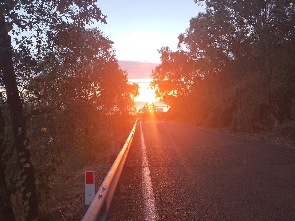 View of a road with sun on the beach